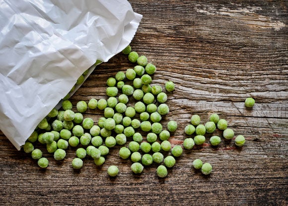 bag of frozen peas spilled on the counter