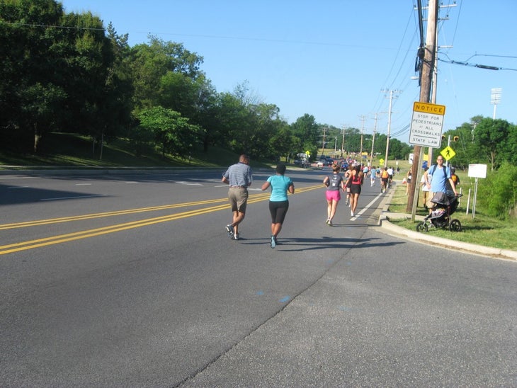 Courtney's dad running with her at a race two summers ago.