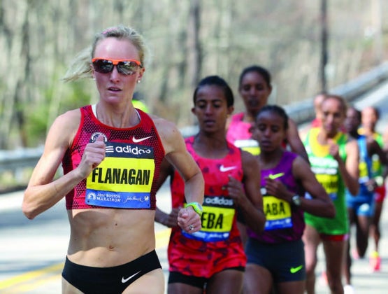 Shalane takes the lead at last year's Boston Marathon.