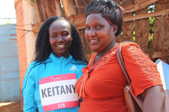 Mary Keitany (left) with midwife Elizabeth Ndunge Mphale, who has worked as a midwife for more than 30 years.