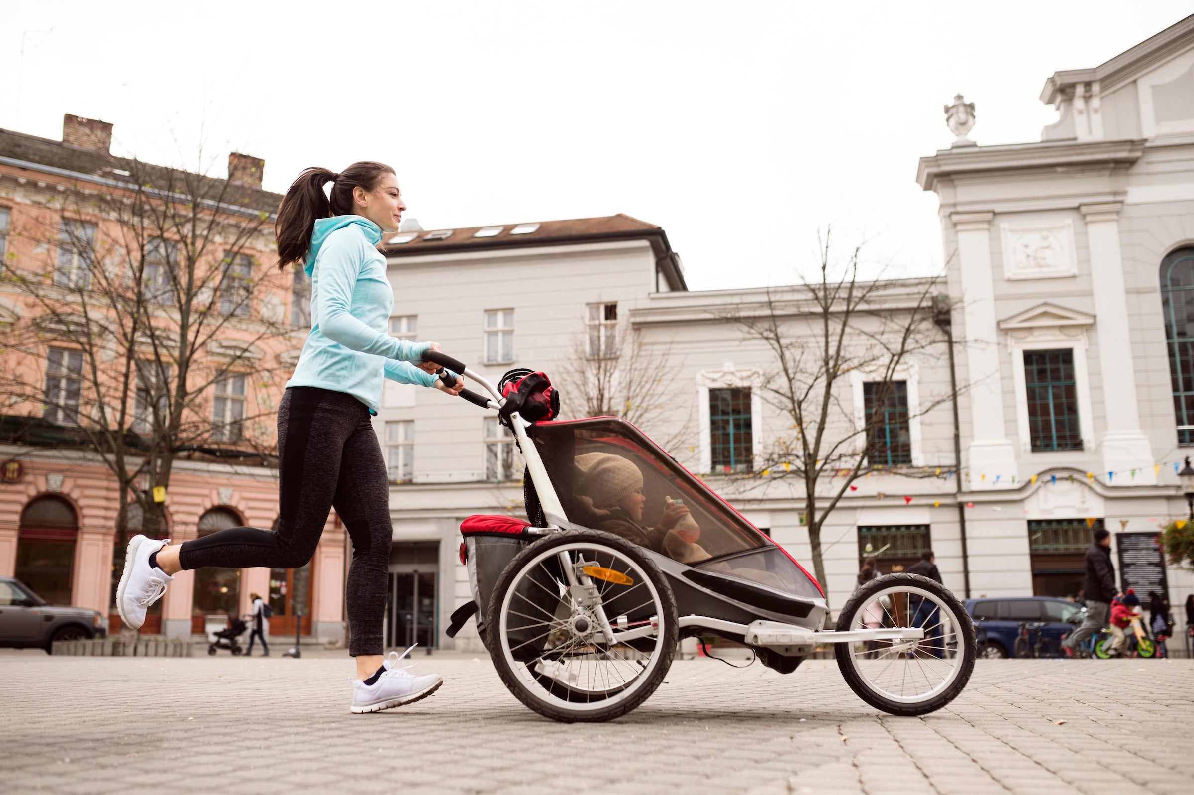 woman-running-with-stroller