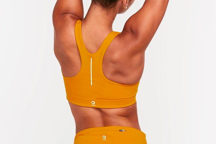 ALWRLD's sports bra in gold