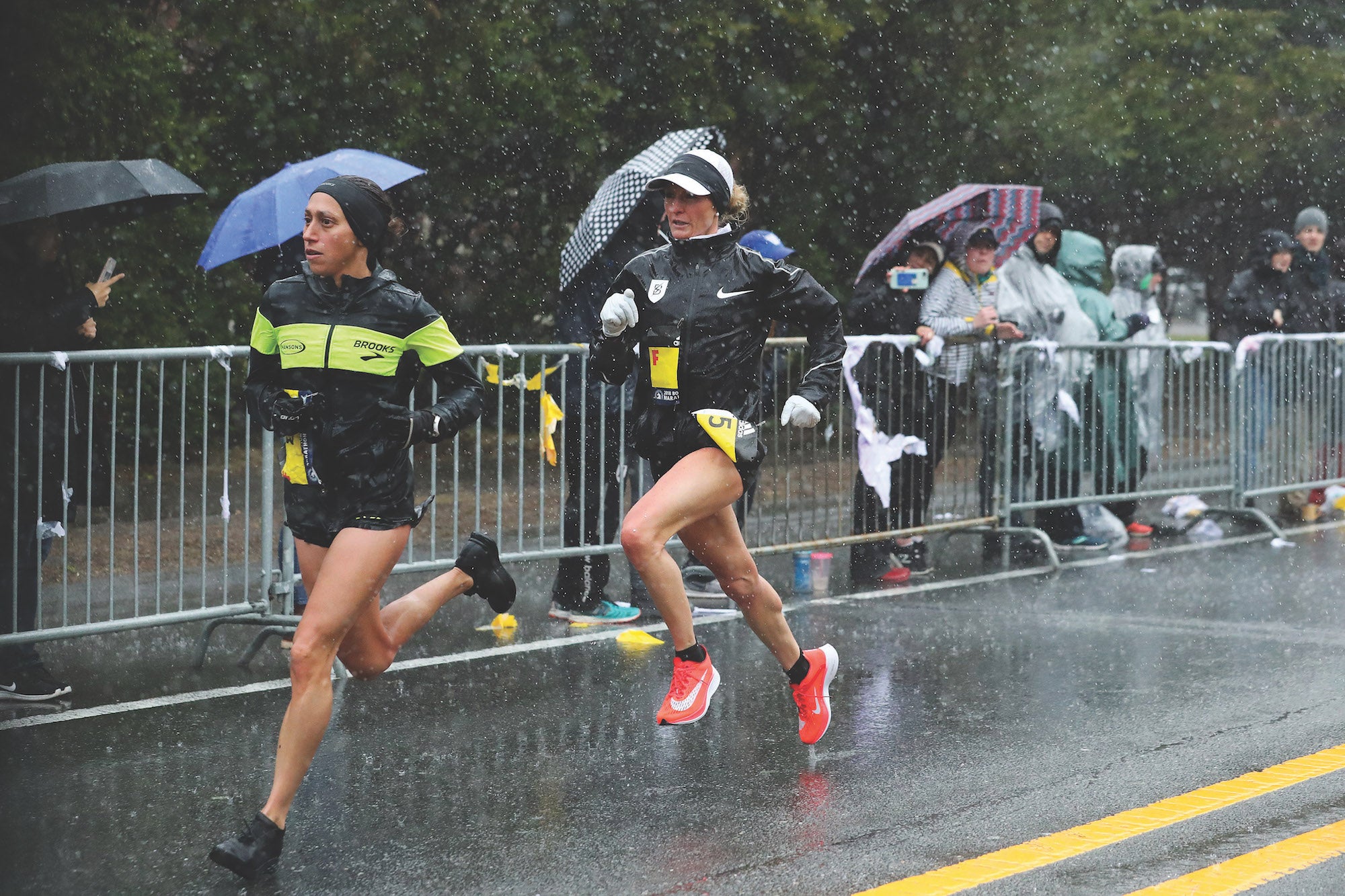 Photo of Des Linden and Shalane Flanagan during the 2018 Boston Marathon by PhotoRun.