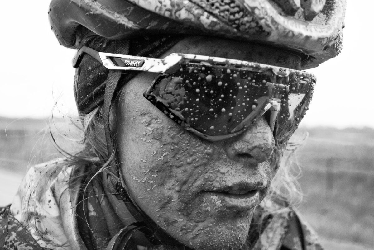 Hillary Allen is covered in mud after a training ride