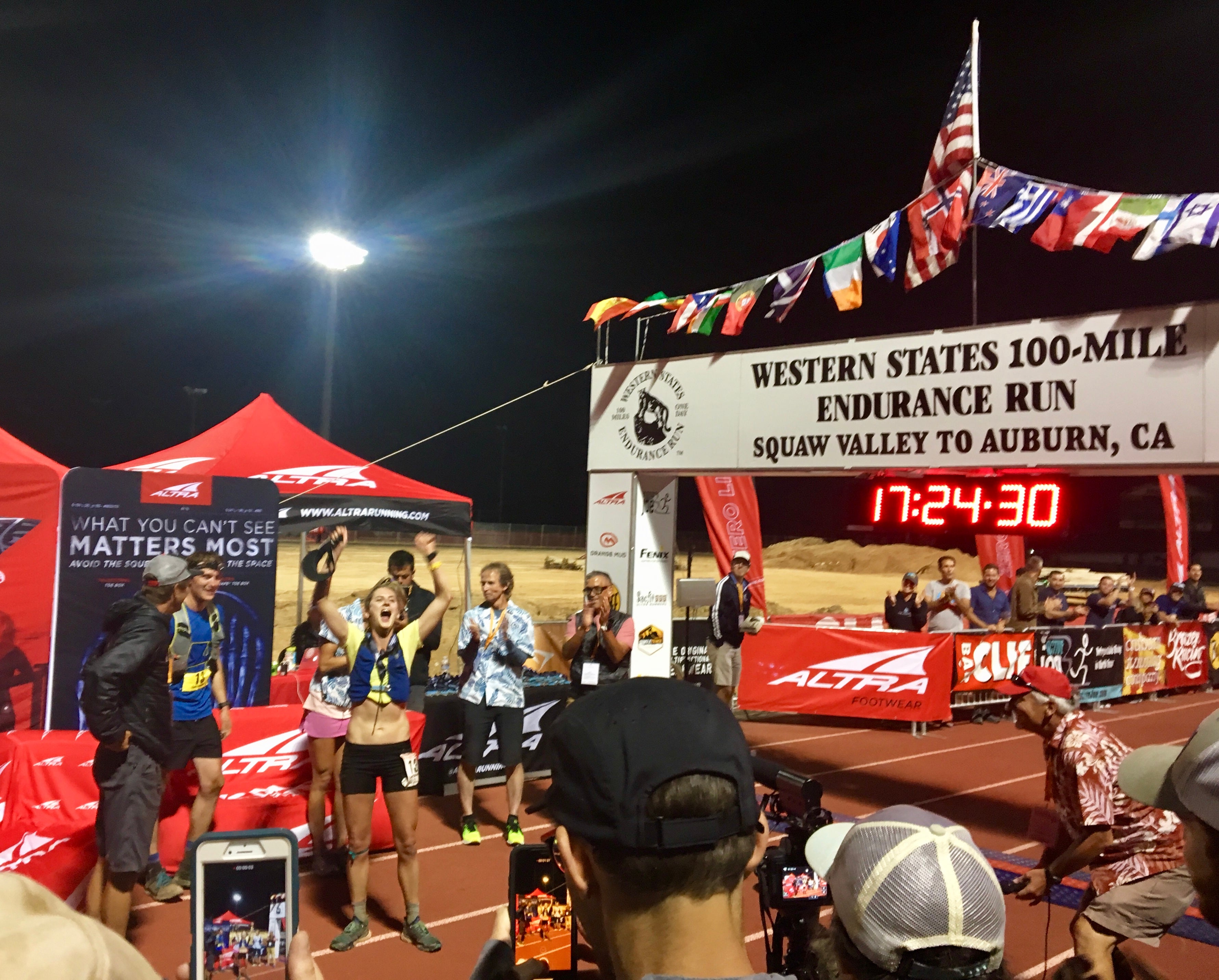 PHOTO: Solmaz Chandler Clare Gallagher celebrates her 2019 Western States Endurance Run win at the finish line.