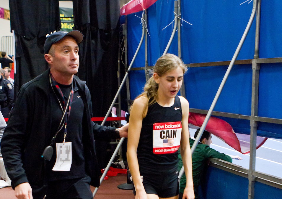 PHOTO: Kevin Morris Alberto Salazar and Mary Cain walk track-side a the 2013 New Balance Indoor Grand Prix track meet.