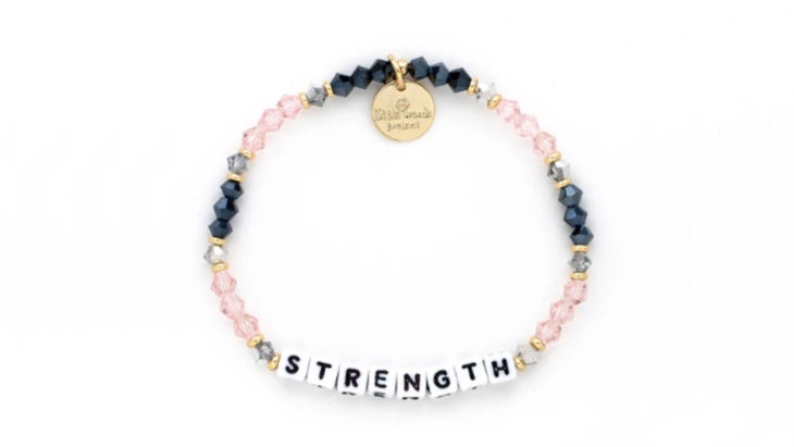 Beaded bracelet with the word "strength"