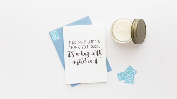 Thank-you card with candle and stamps