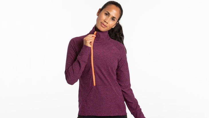 Woman in dark fuchsia zip sweatshirt