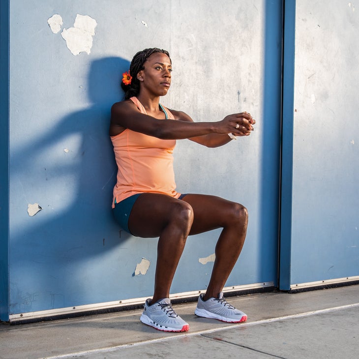 Alysia Montano demonstrating a wall sit