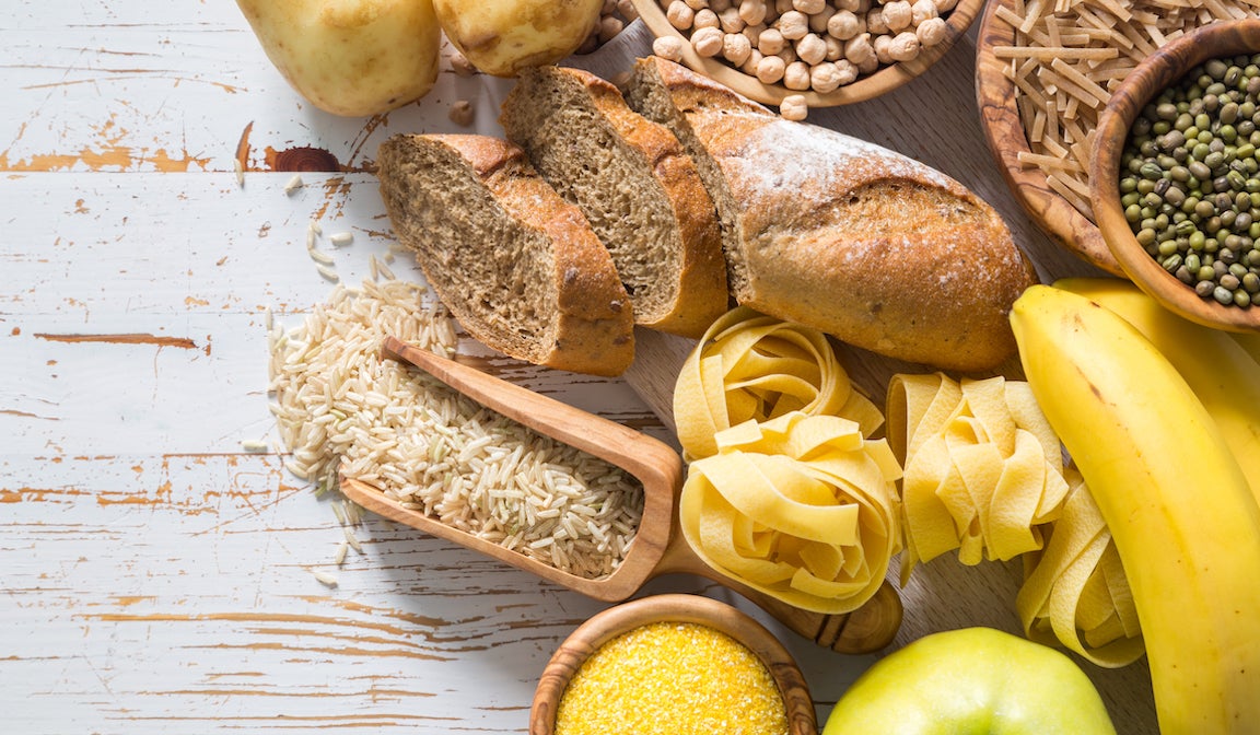 Selection of comptex carbohydrates sources on white background, copy space