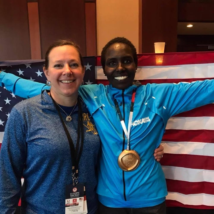 Jean Knaack congratulates 2020 Olympic Marathon Trials winner, Aliphine Tuliamuk.