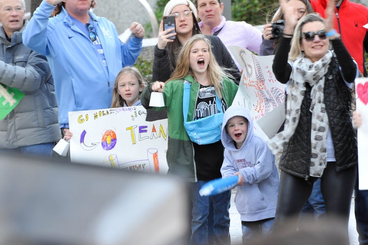 Kids of Northern Arizona Elite cheer at the 2020 Olympic Marathon Trials