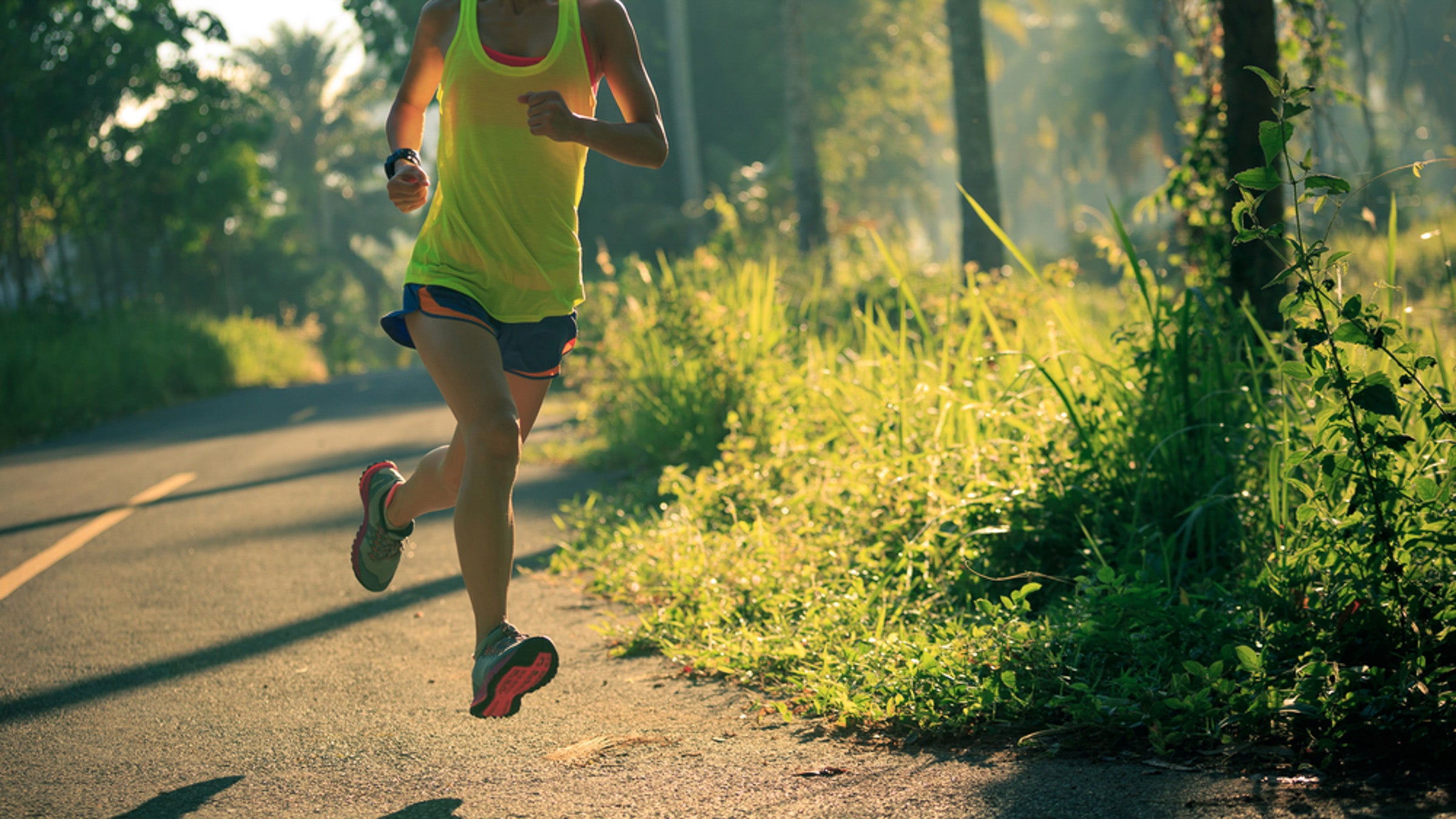 Running on road in late afternoon