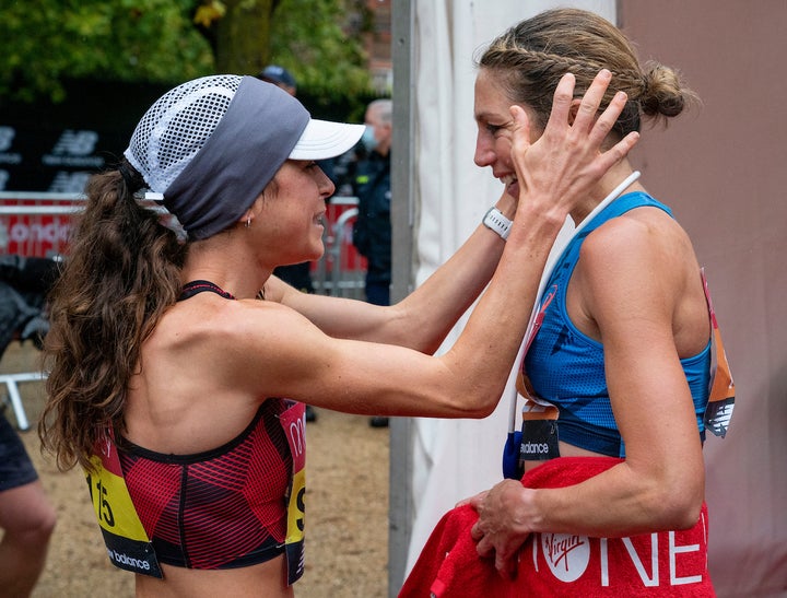 Molly Seidel (USA) congratulates Sara Hall (USA) after Sara Hall (USA) finishes second in the Elite Women's Race as part of the historic elite-only Virgin Money London Marathon taking place on a closed-loop circuit around St James's Park in central London on Sunday 4 October 2020.