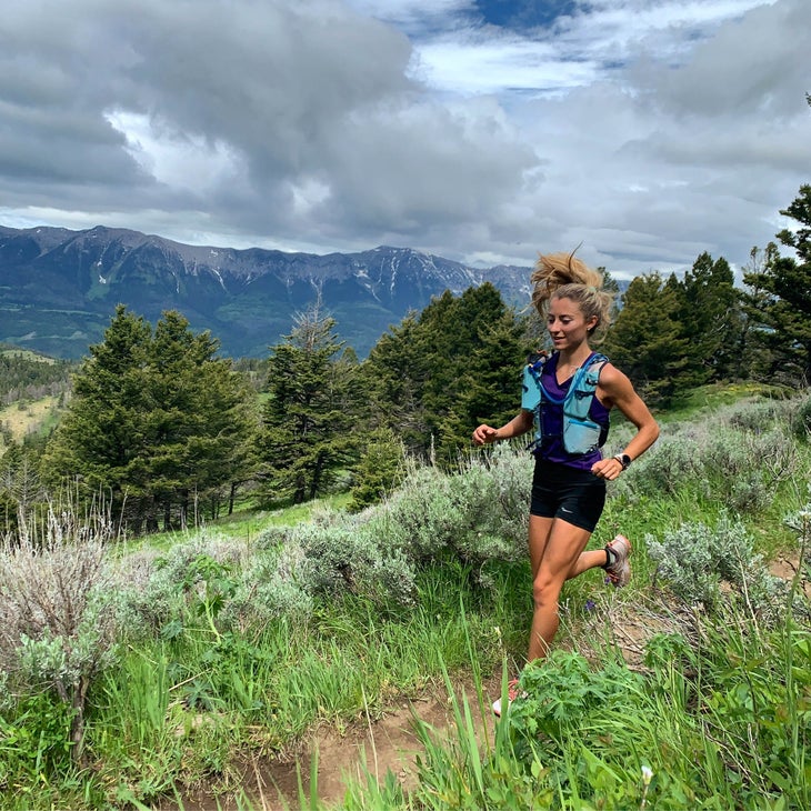 Murphy running in the mountains at summertime