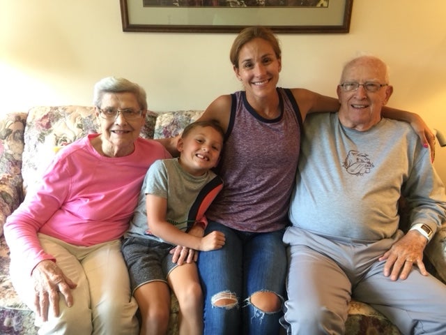 kara-goucher-with-son-and-grandparents
