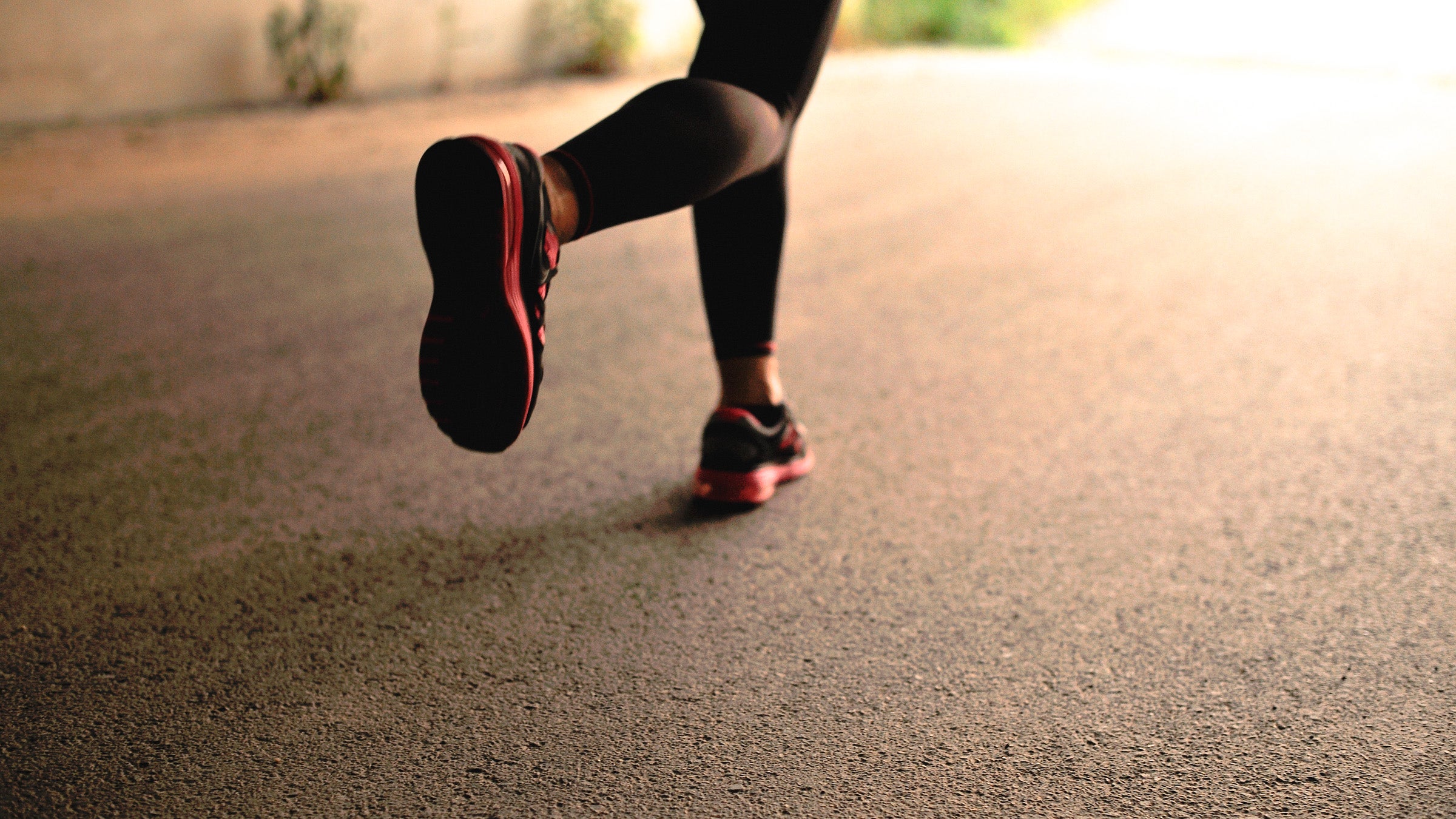 Woman jogging in the road