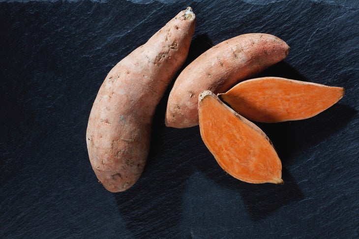 Sliced sweet potatoes are a fall produce pick with lots of health benefits.