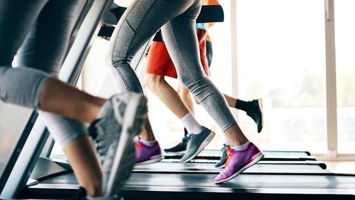 Picture of people running on treadmill in gym.