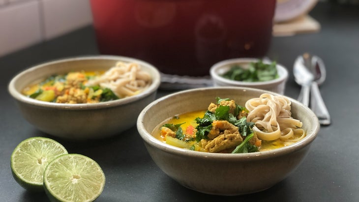 Elyse Kopecky's turkey coconut curry soup in bowls is a hormone balancing recipe