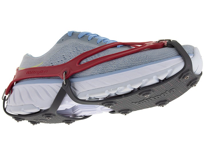 running shoe with red spikes attached