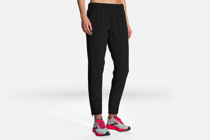 brooks shakeout pants on a woman