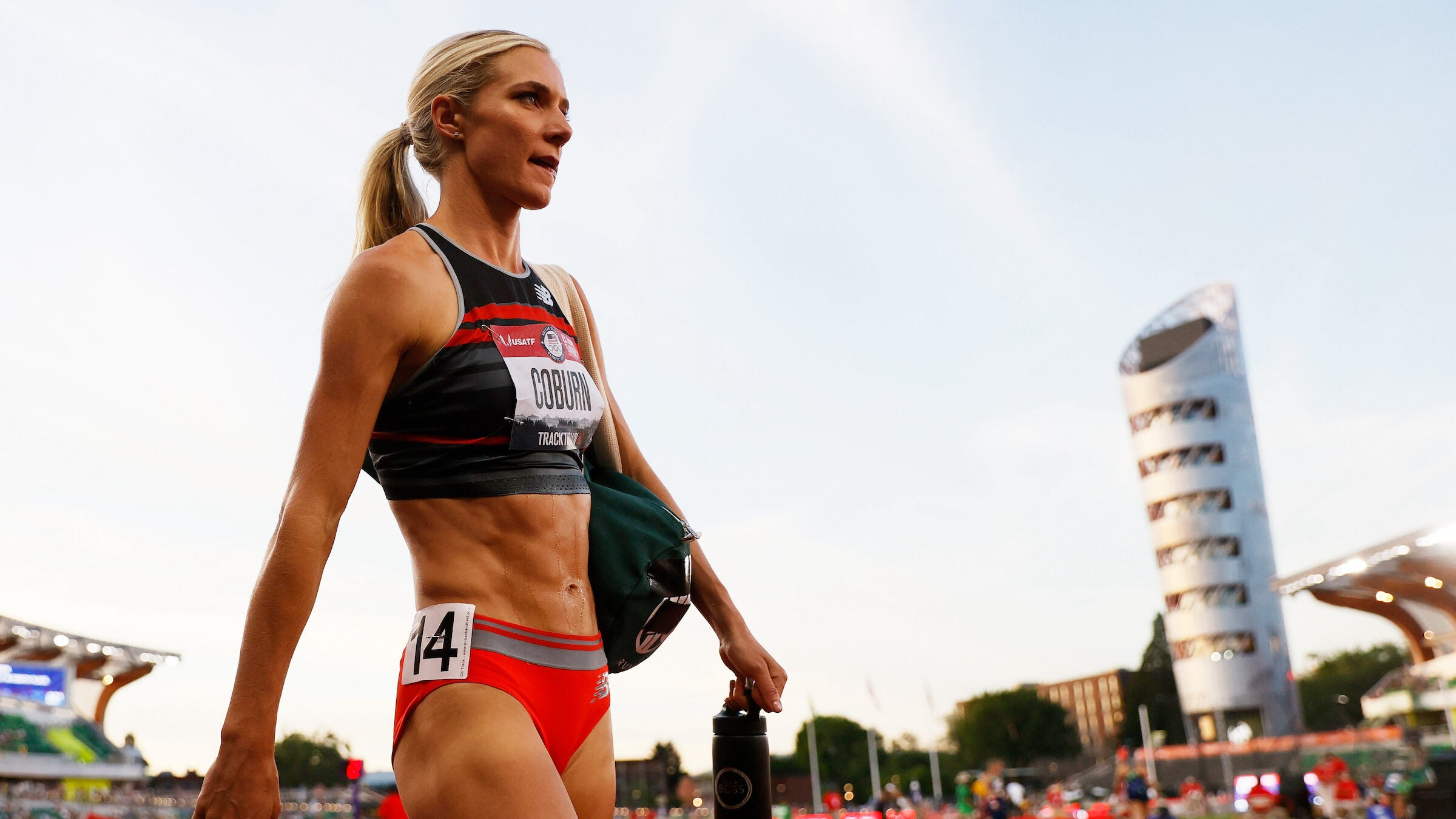 Emma Coburn walks out onto a track outside during summer to compete in the 3,000-meter steeplechase