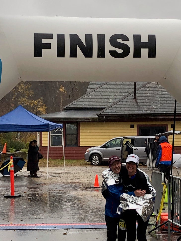 Catherine Popp and her sister Terri Pop at a finish line in New Hampshire