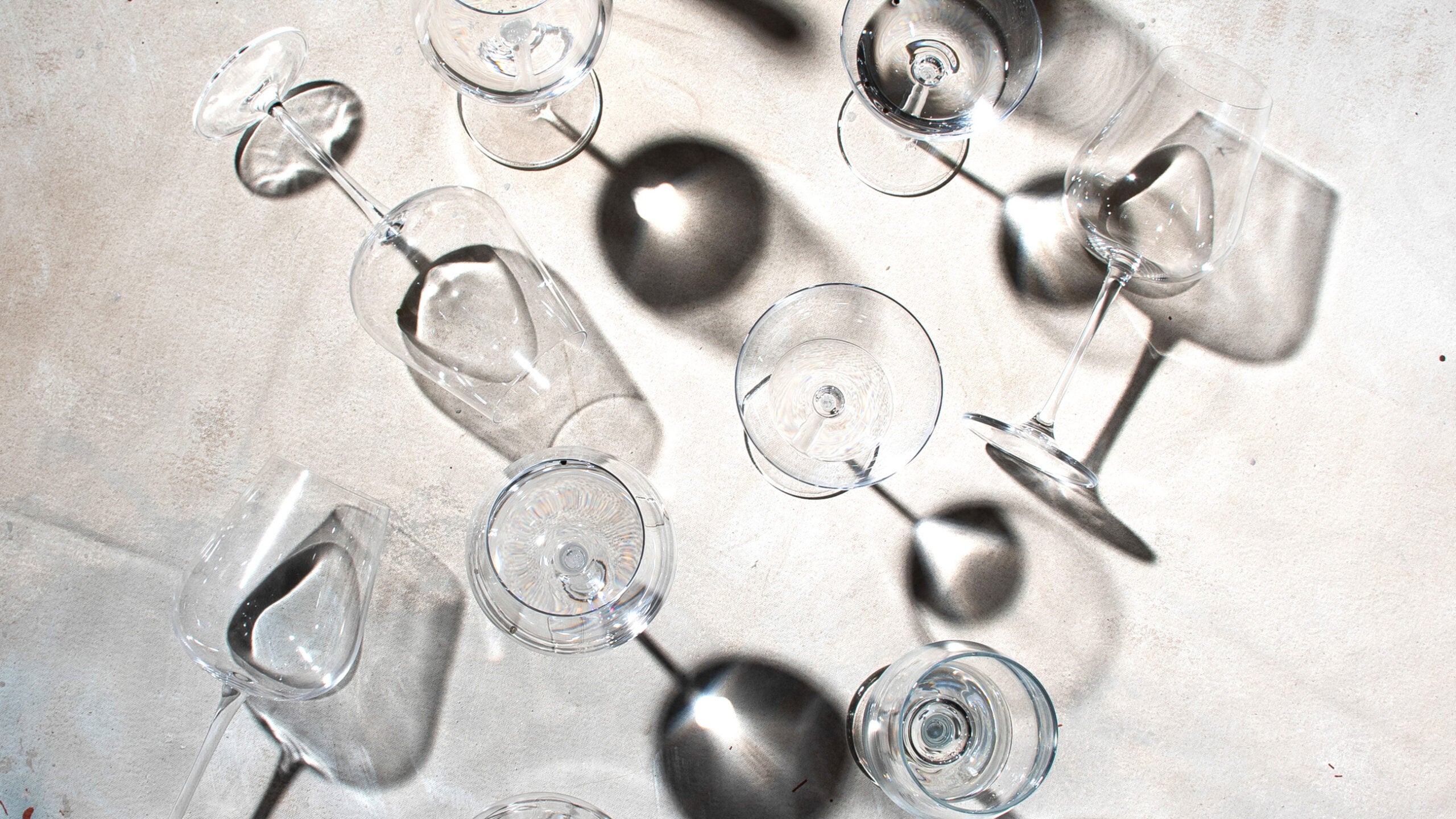 empty wine glasses on a table symbolizing Dry January benefits