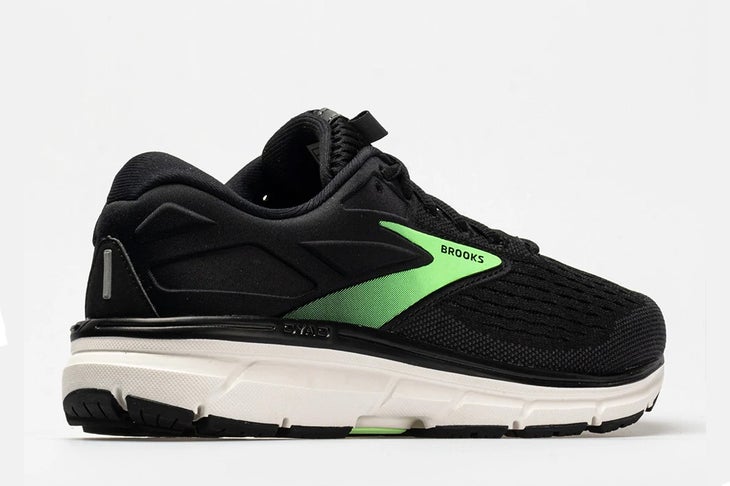 the brooks dyad in black and green, one of the best running shoes for women with flat feet