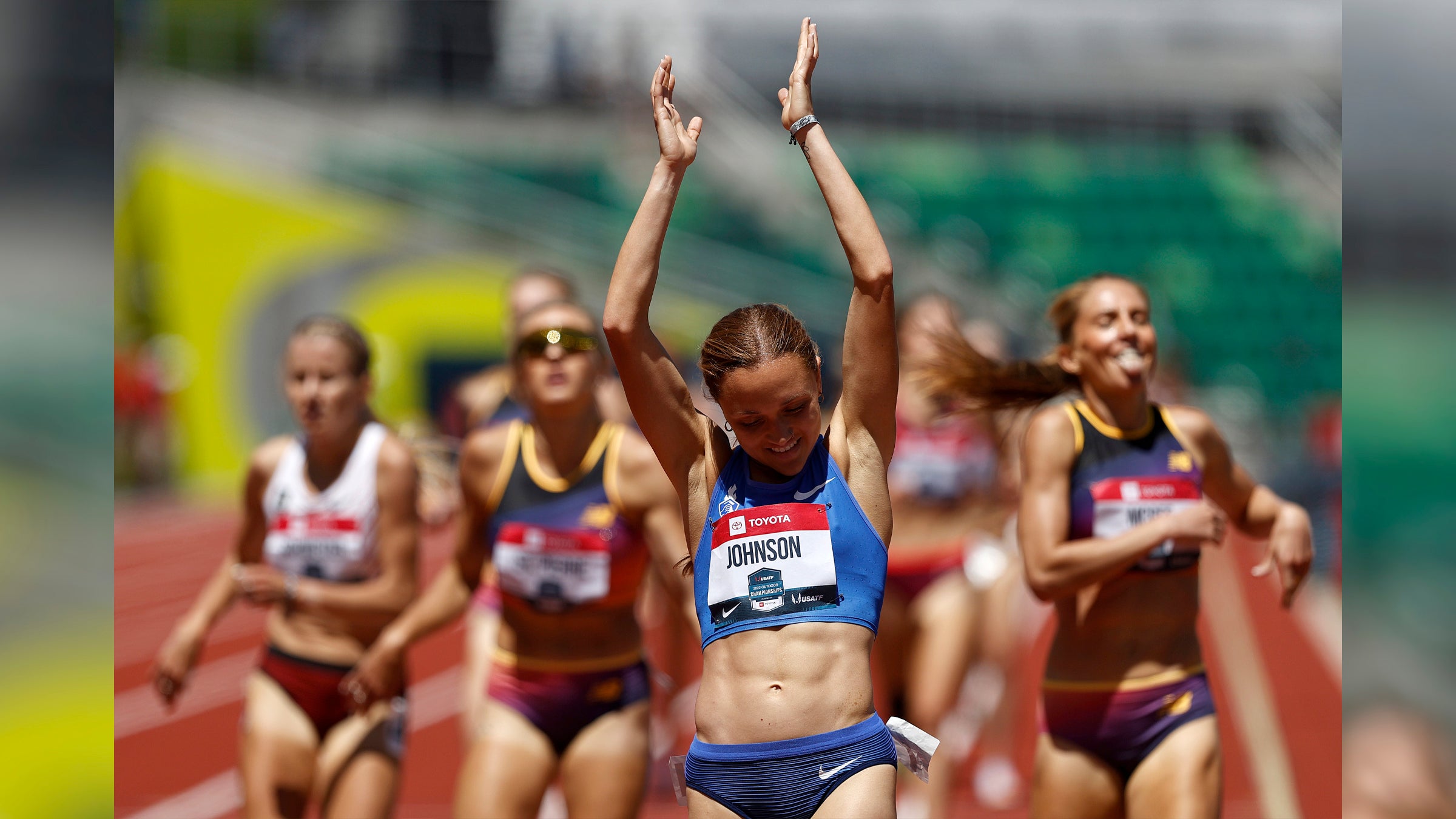 Sinclaire Johnson with her hands up clapping after winning the 2022 USATF 1500m finals.
