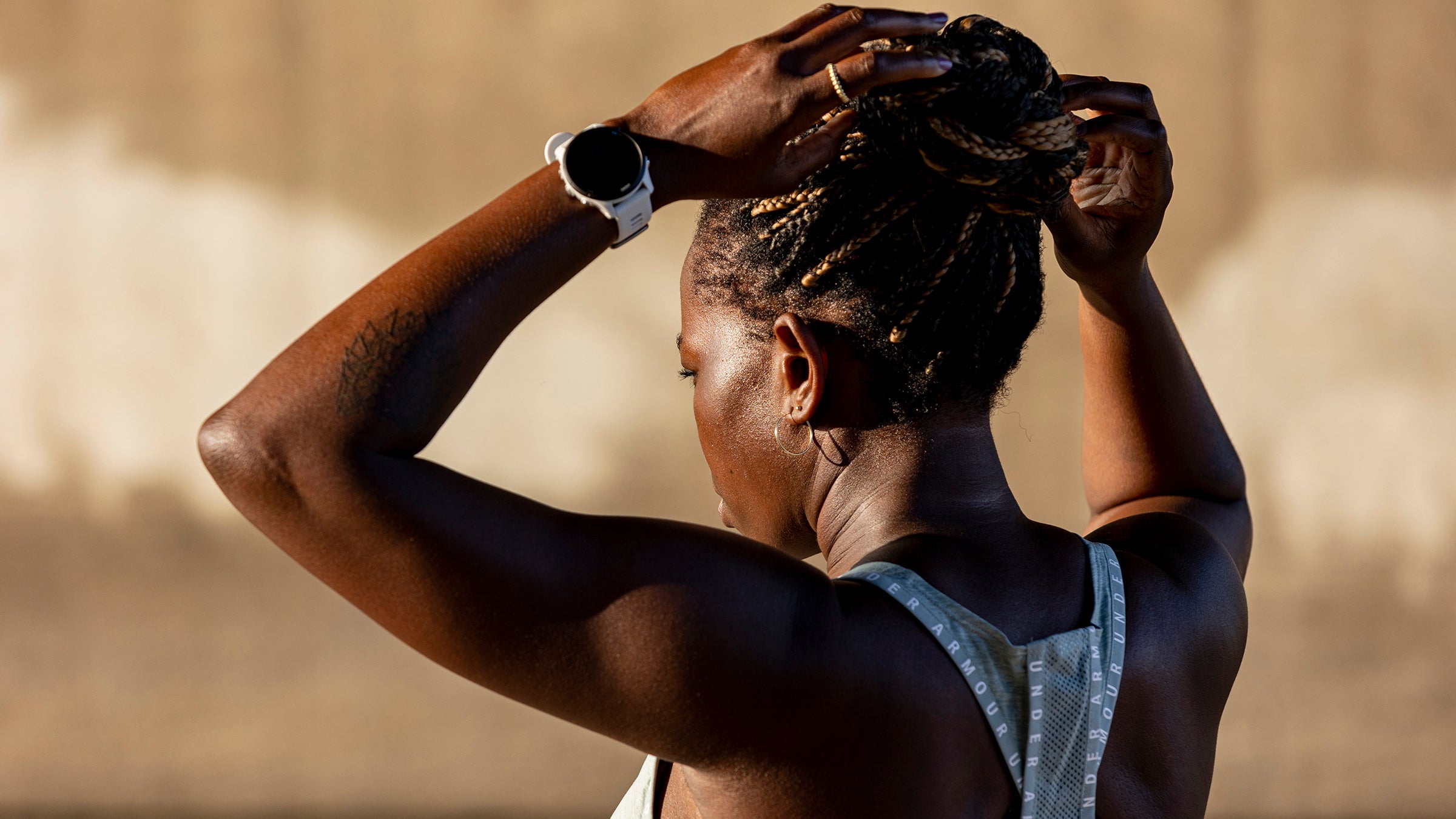 Mireille Siné in an Under Armour running top