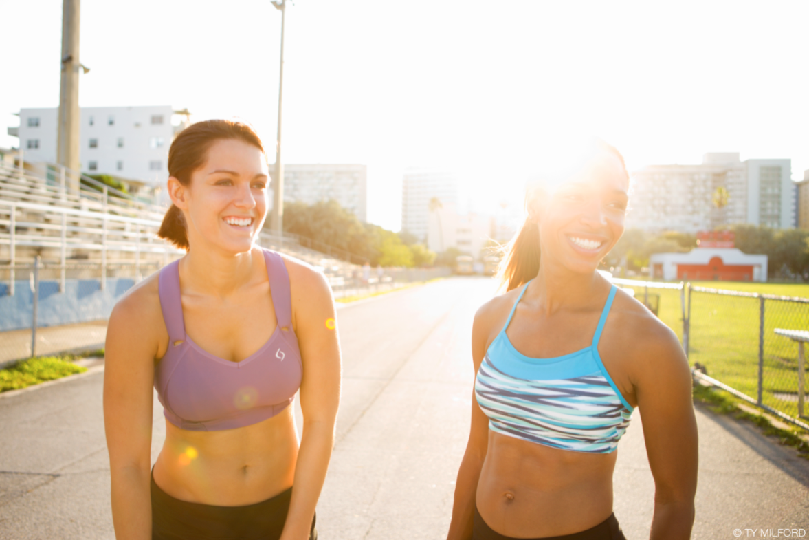 girl running in sports bra