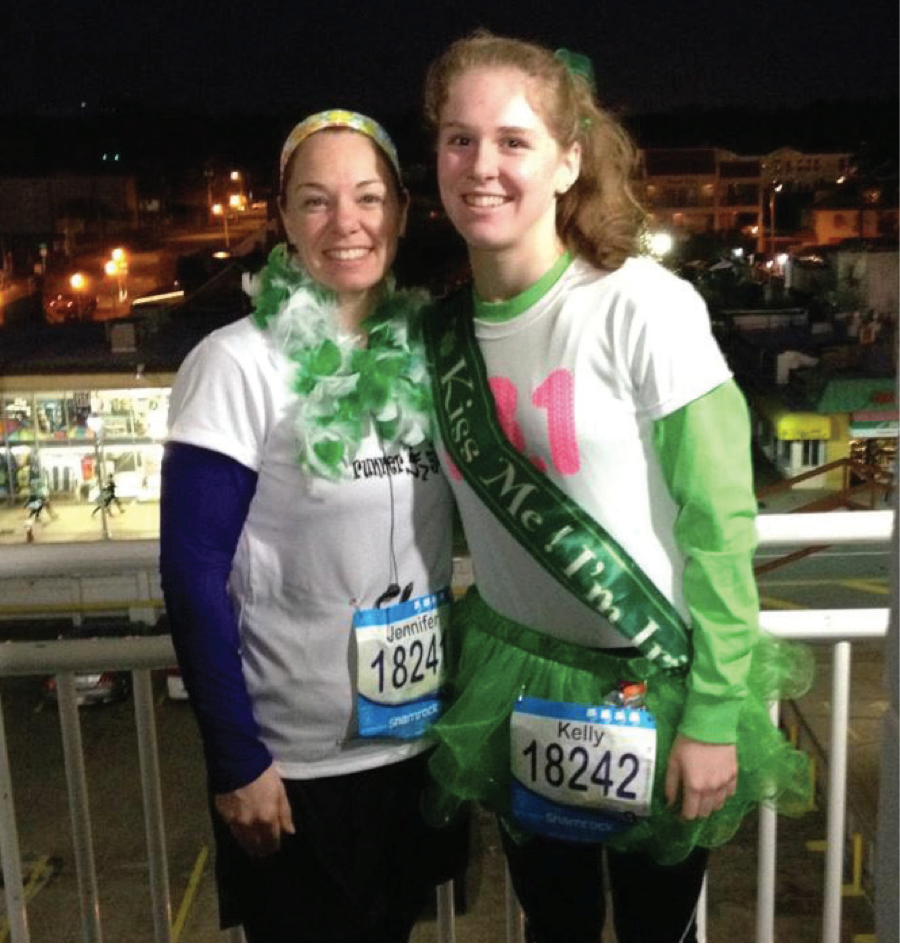 Kelly (right) and her mom the morning of the Shamrock Running Festival half marathon