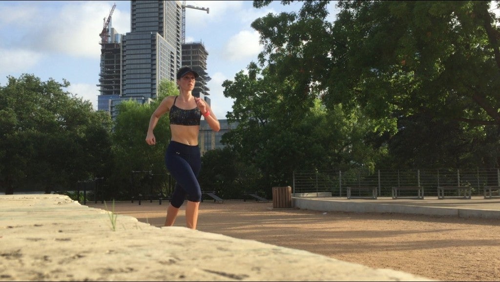 running in just a sports bra