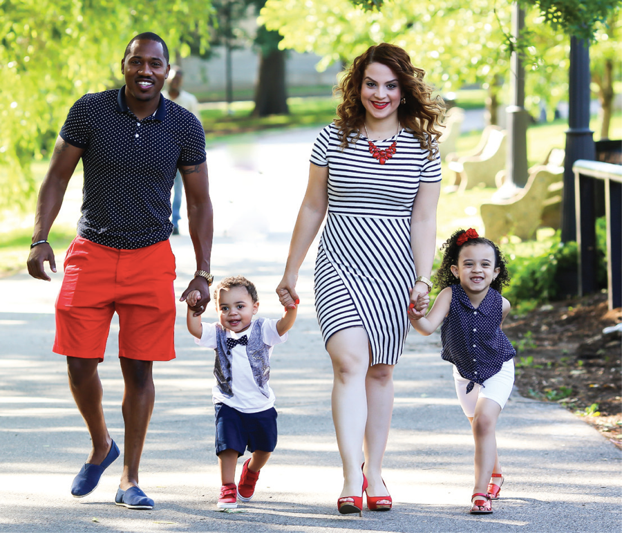 ELAINE WITH HER HUSBAND, DARRYL, AND TWO CHILDREN, EVA AND IAN.