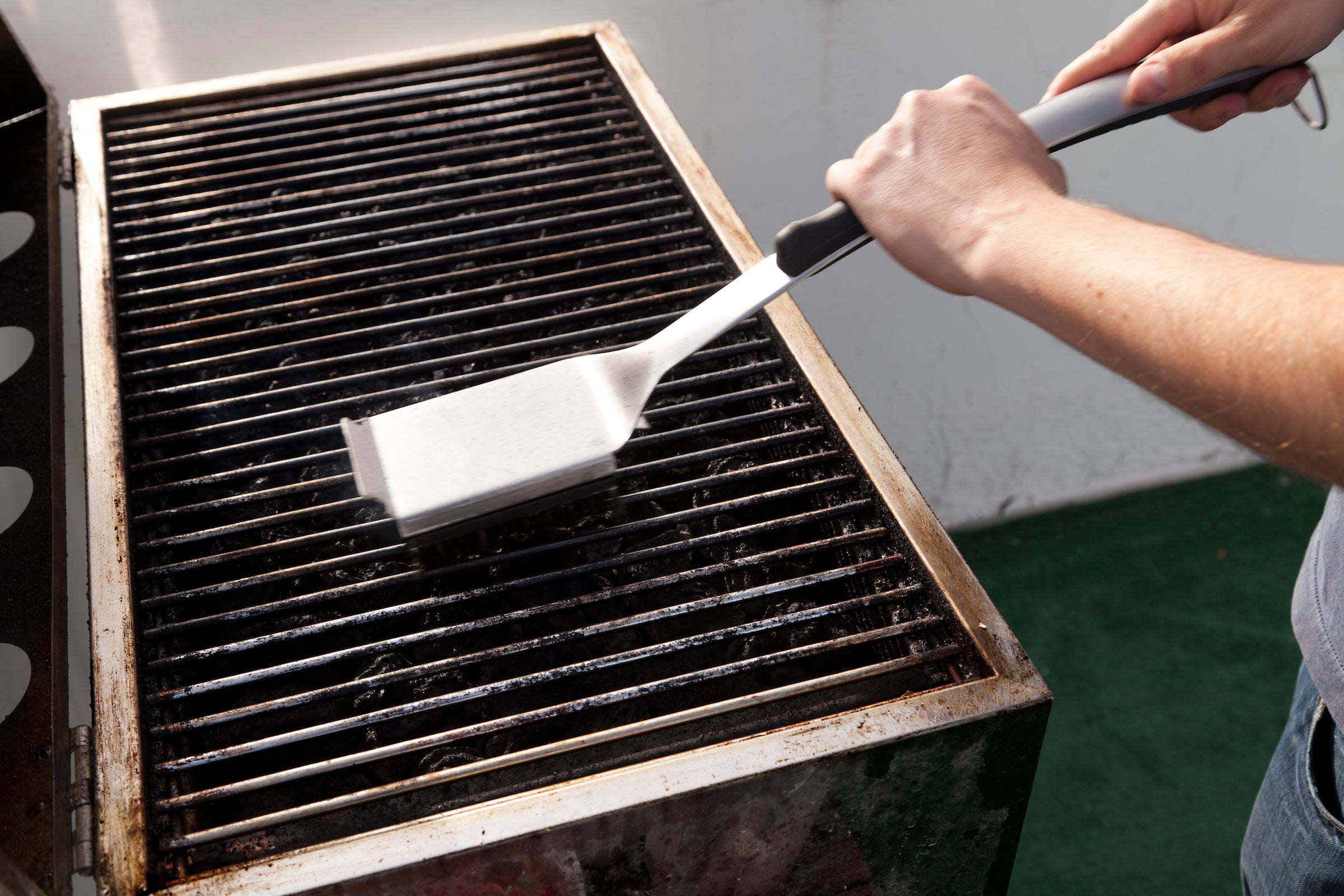 cleaning the grill before use