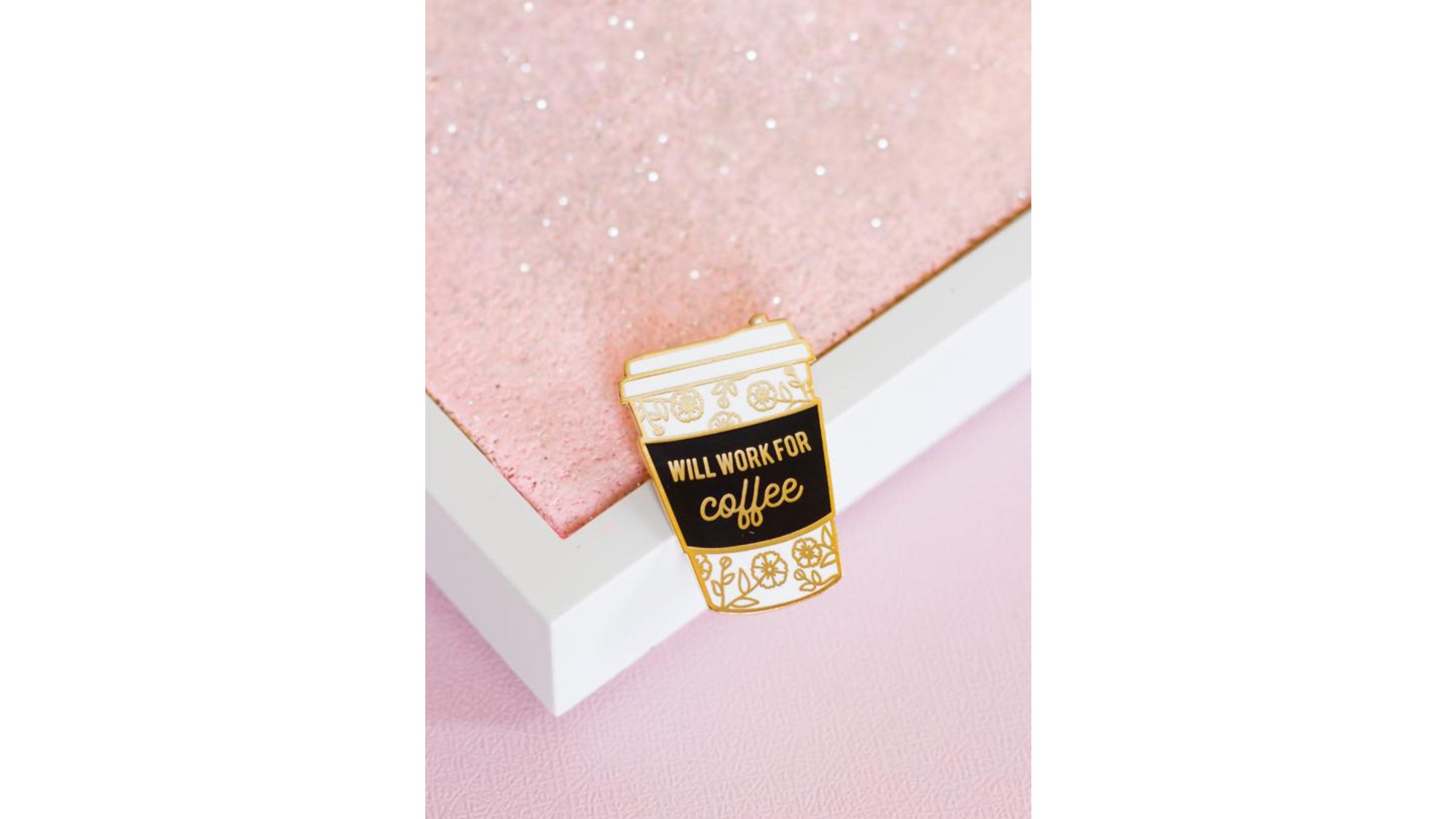 Coffee cup-shaped pin saying "will work for coffee"