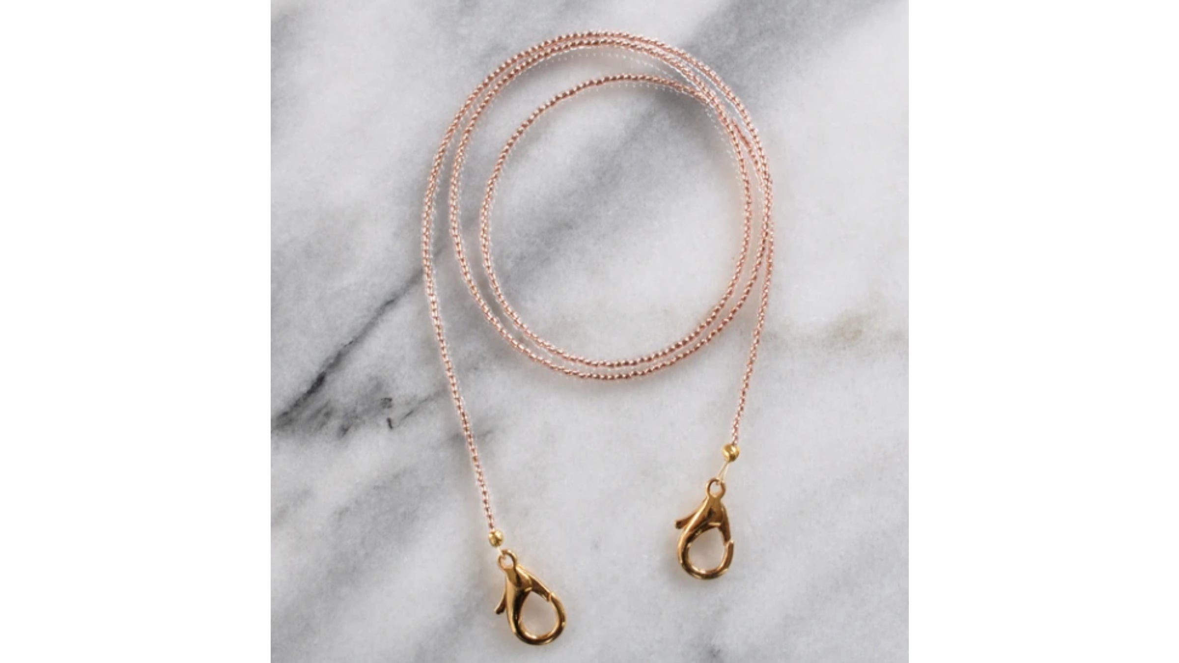 Pink beaded chain with gold clasps