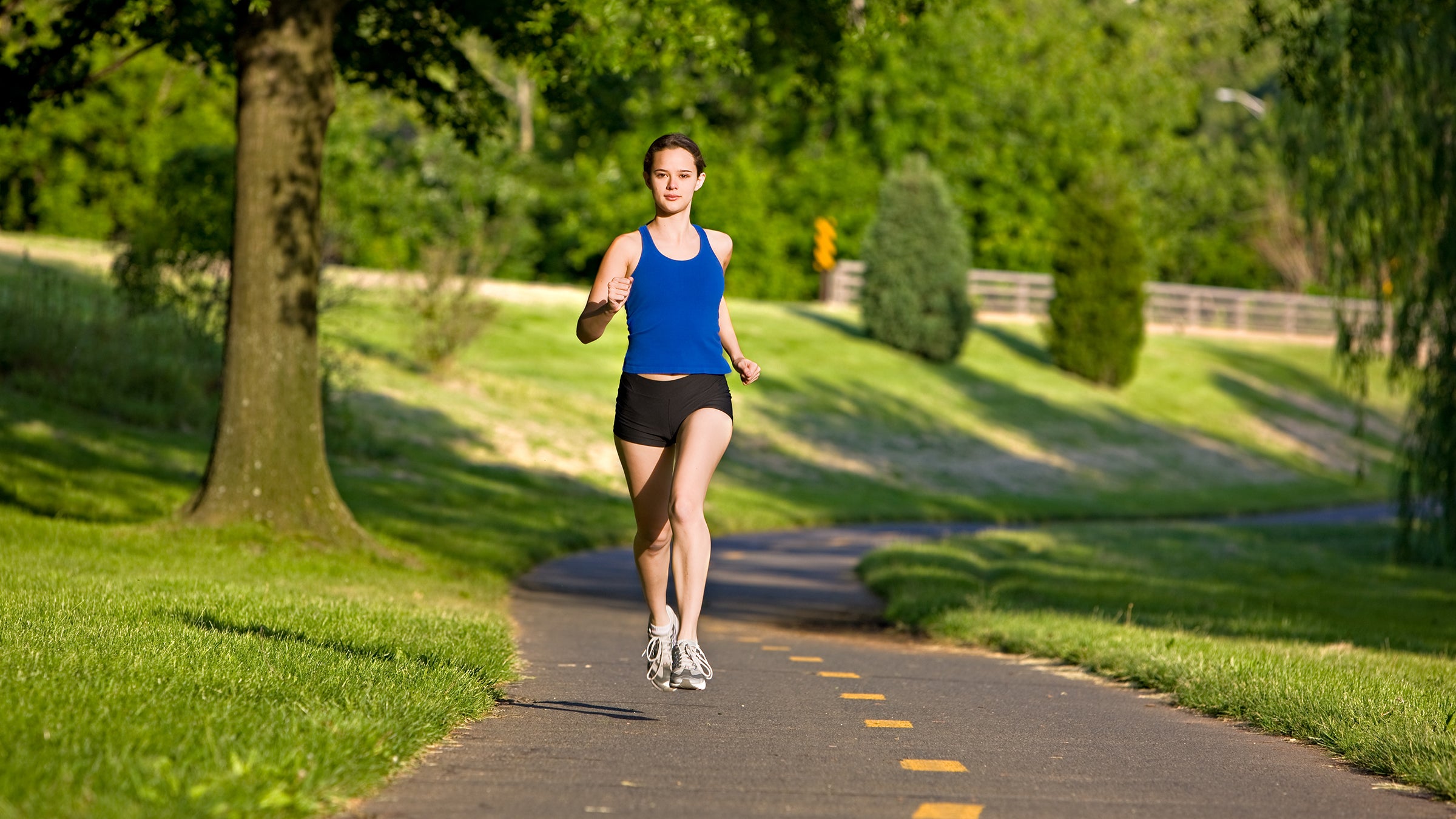 Woman running in a park