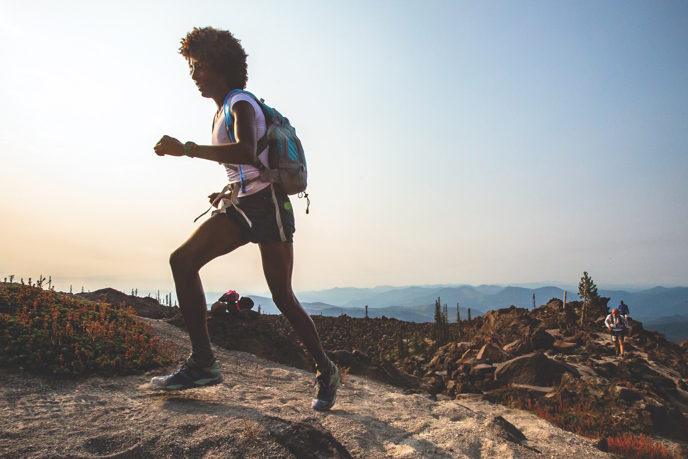 Peyton Thomas trail running at dusk